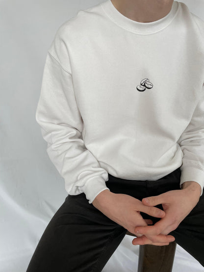 White sweater white our now design in the picture you can see the coffee beans